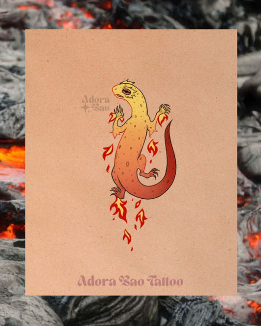 Tattoo design of a lizard with flames on a textured beige background, featuring 'Adora Sao Tattoo' branding.